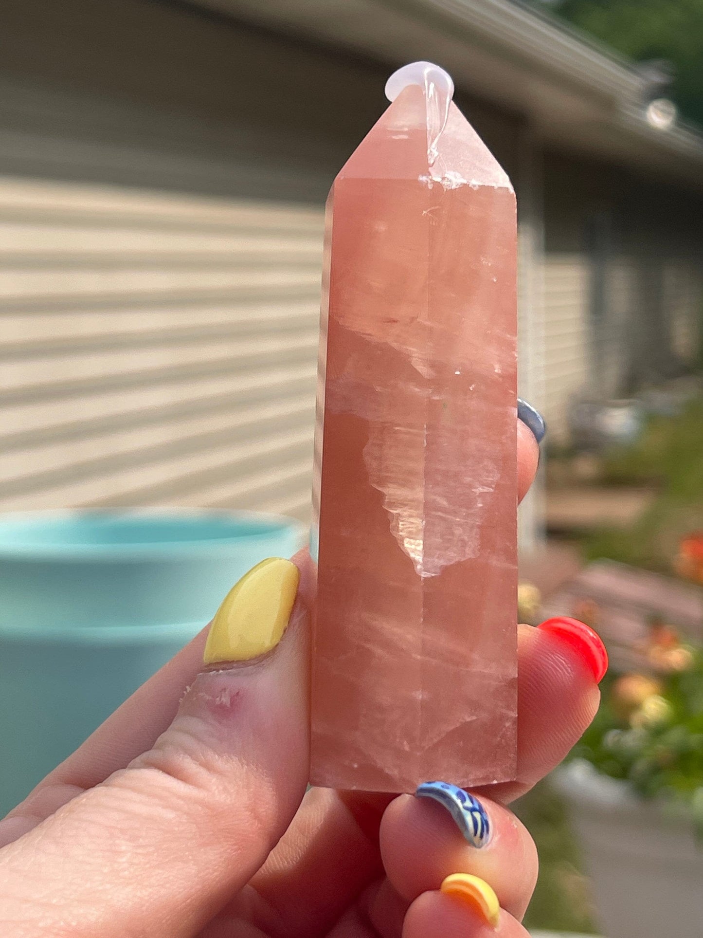 Natural rose calcite tower
