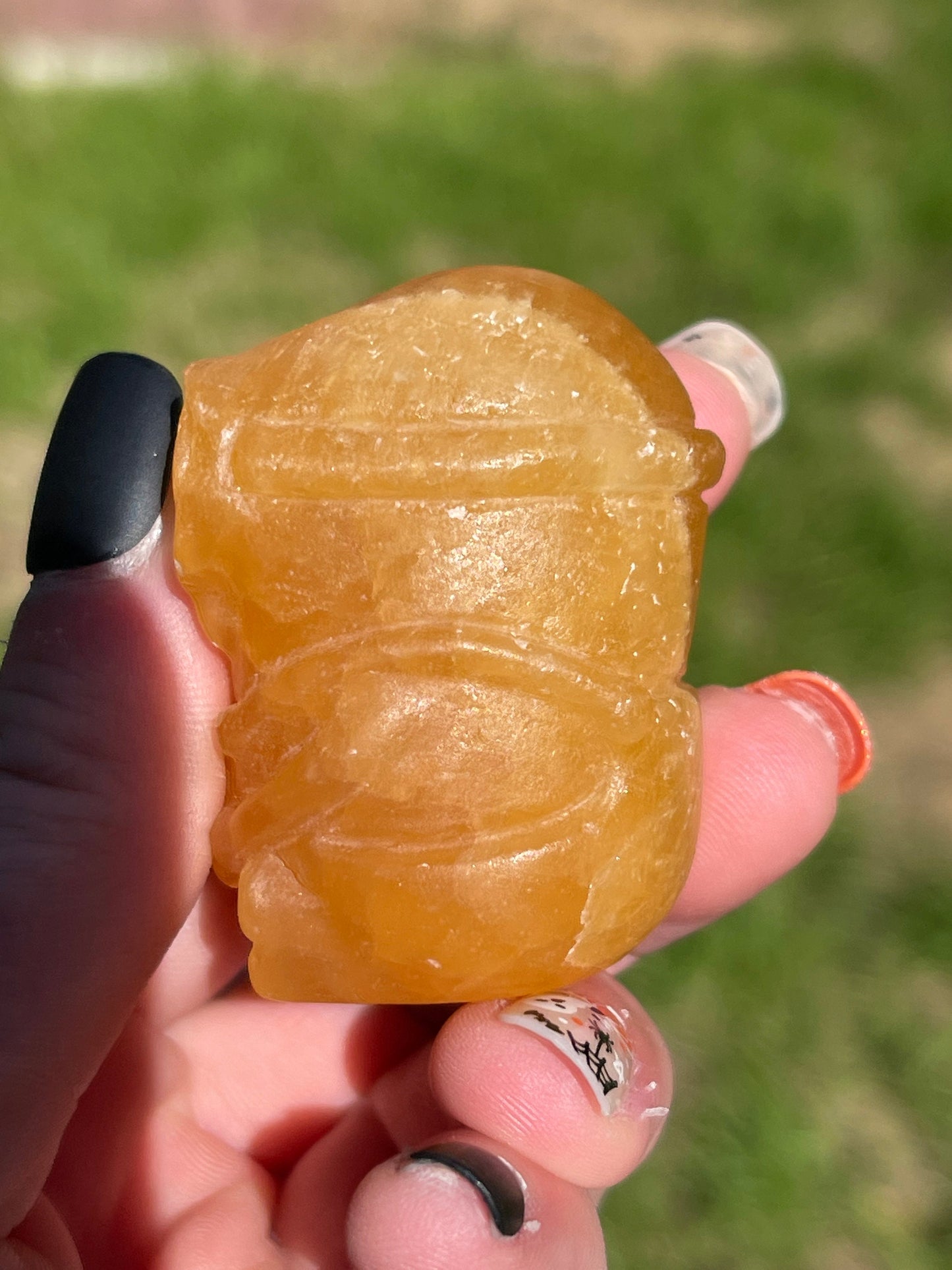 Orange Calcite Minon Carving