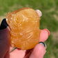 Orange Calcite Minon Carving