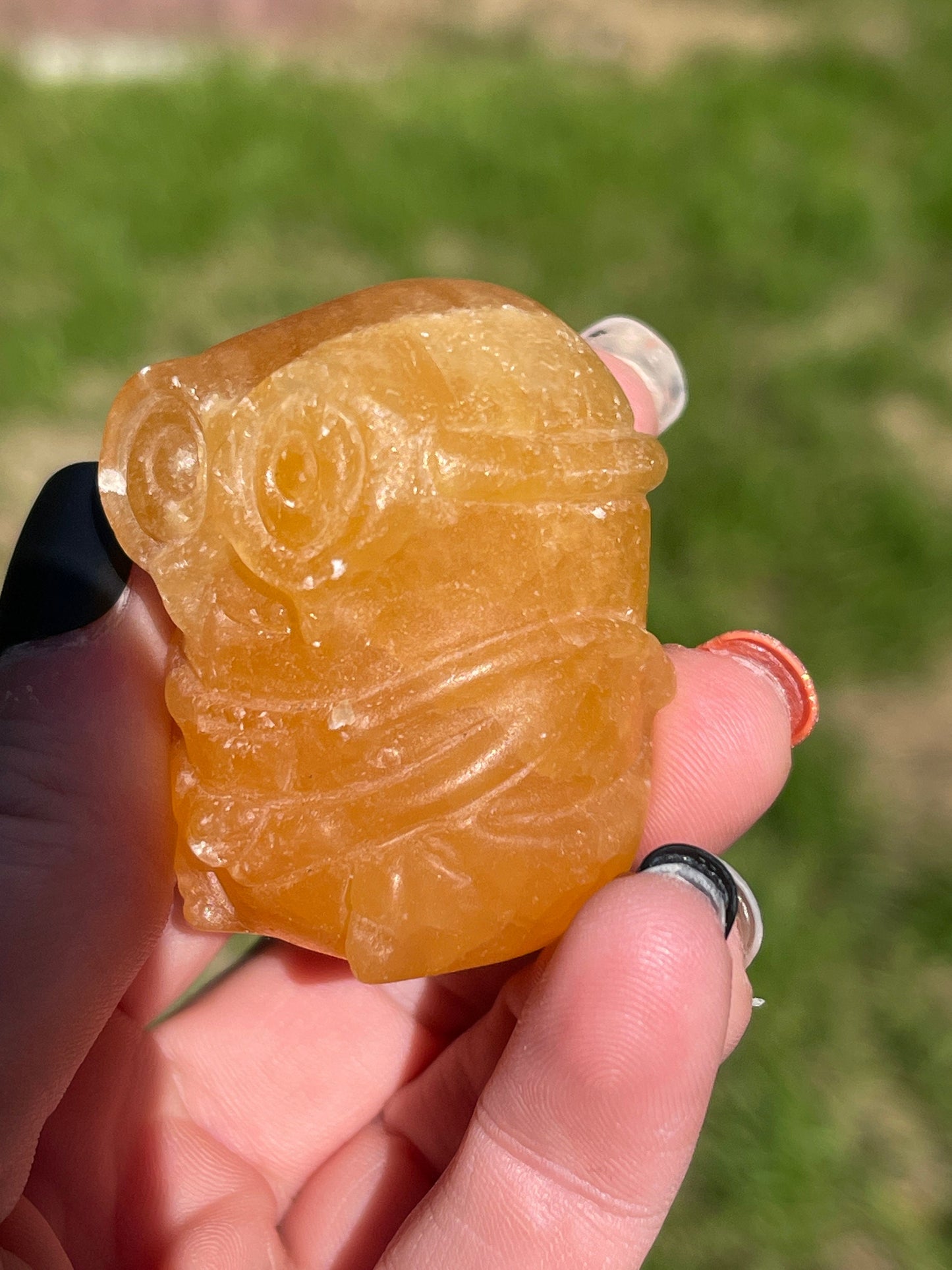 Orange Calcite Minon Carving