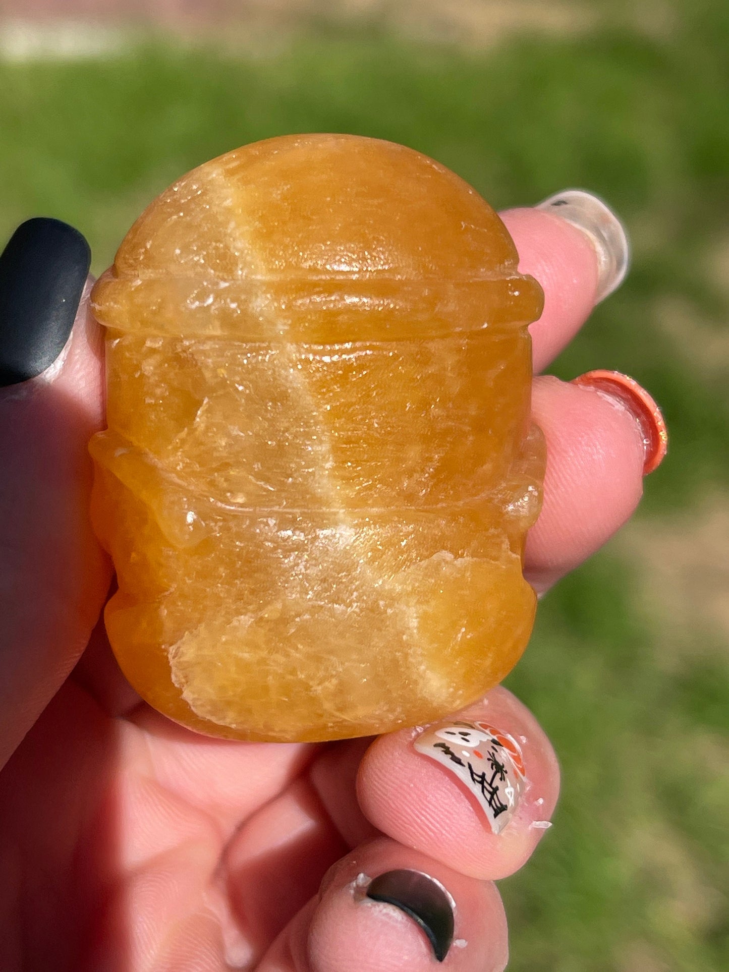 Orange Calcite Minon Carving