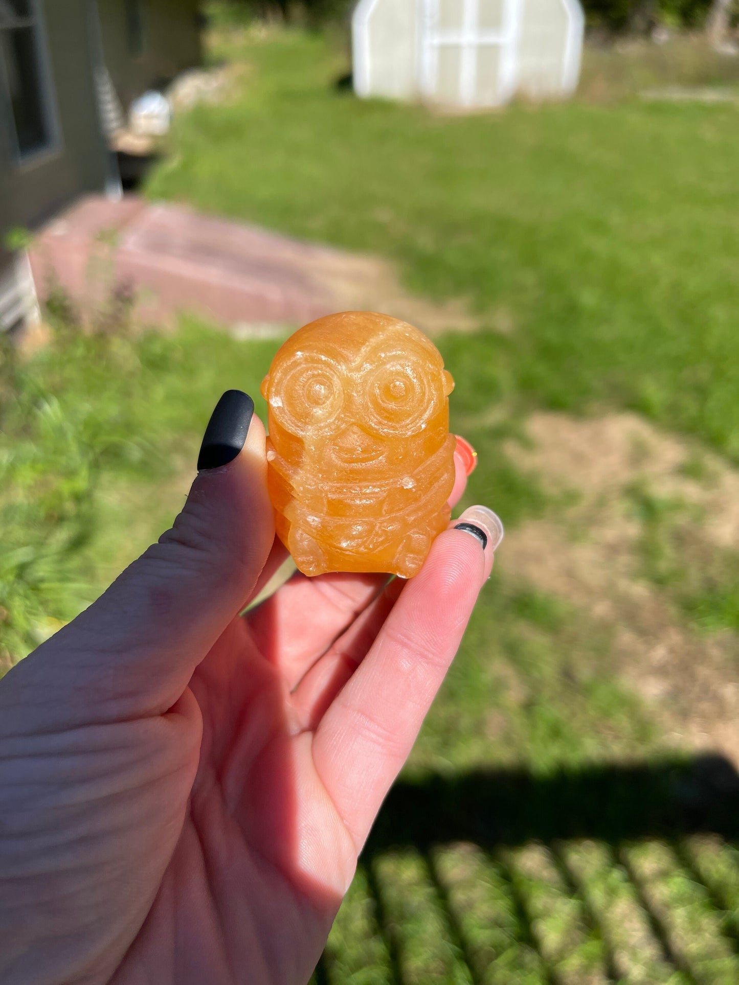 Orange Calcite Minon Carving