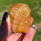 Orange Calcite Minon Carving
