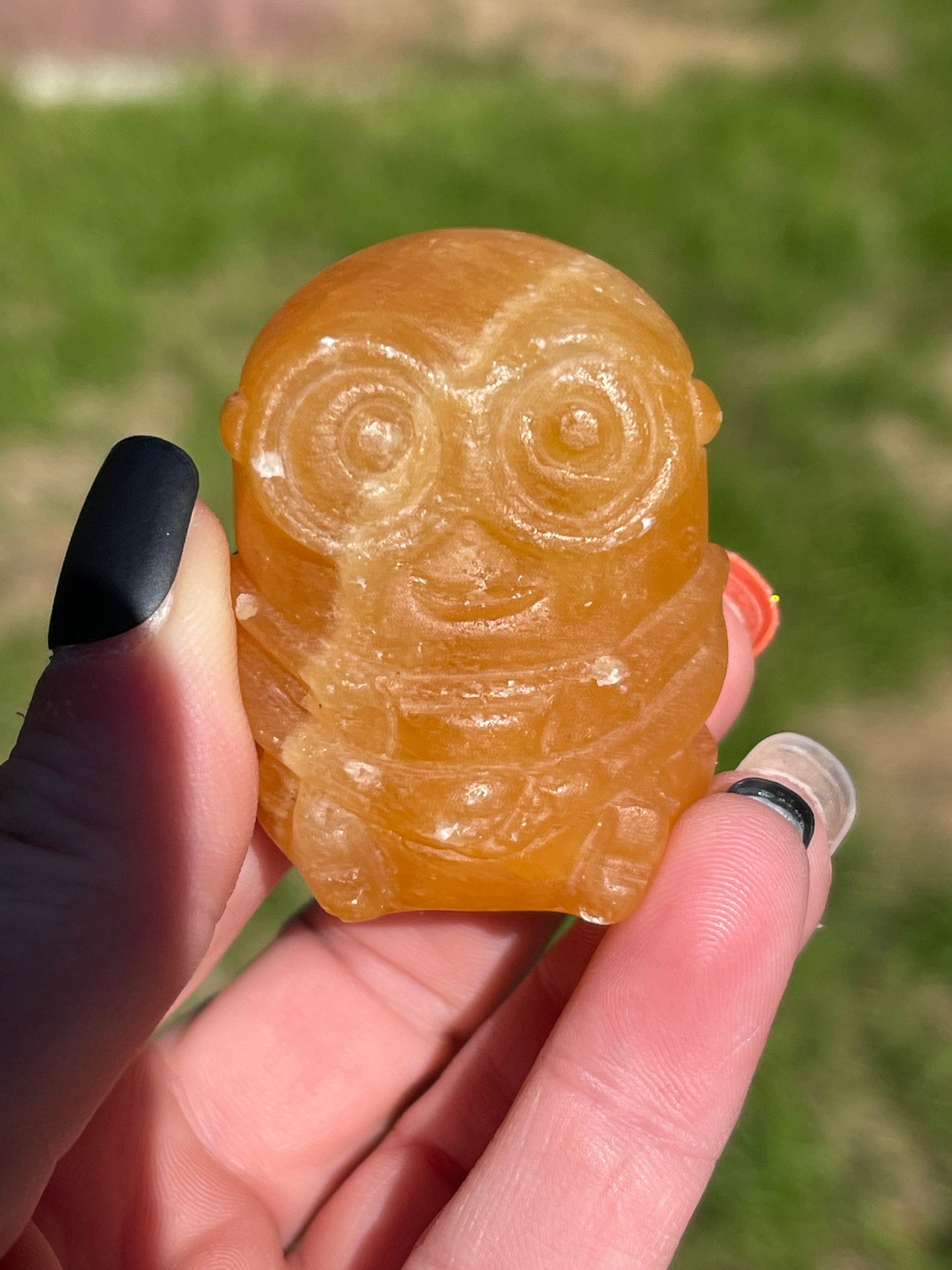 Orange Calcite Minon Carving