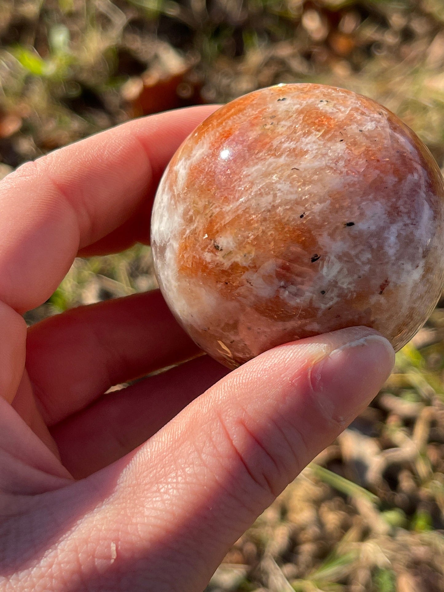 Sunstone with moonstone crystal sphere