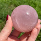 Rose quartz sphere with rainbow