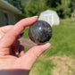 Silver sheen obsidian sphere