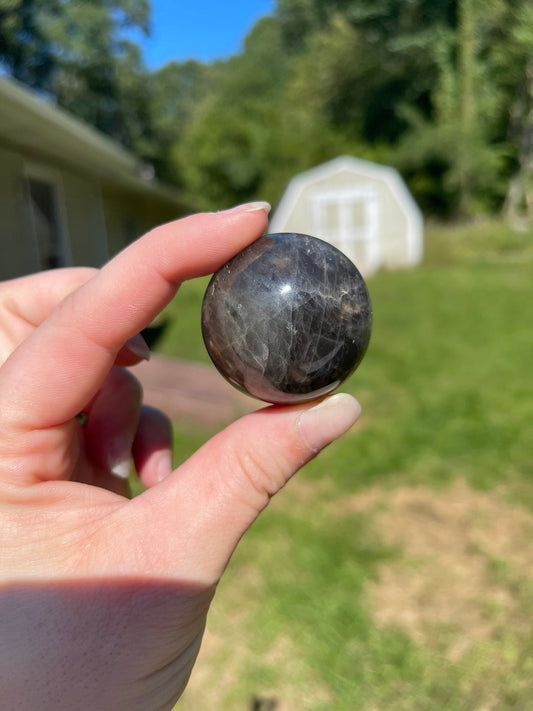 Silver sheen obsidian sphere