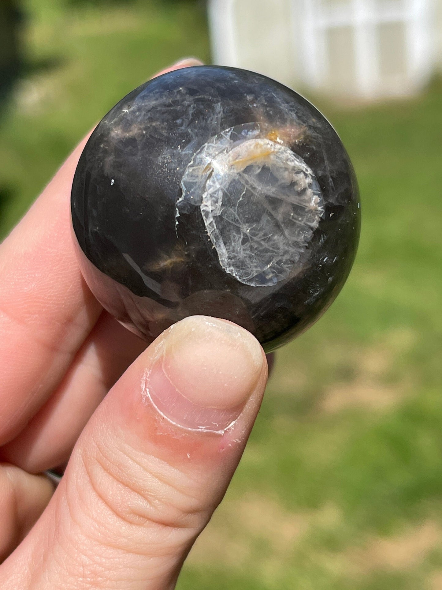 Silver sheen obsidian sphere