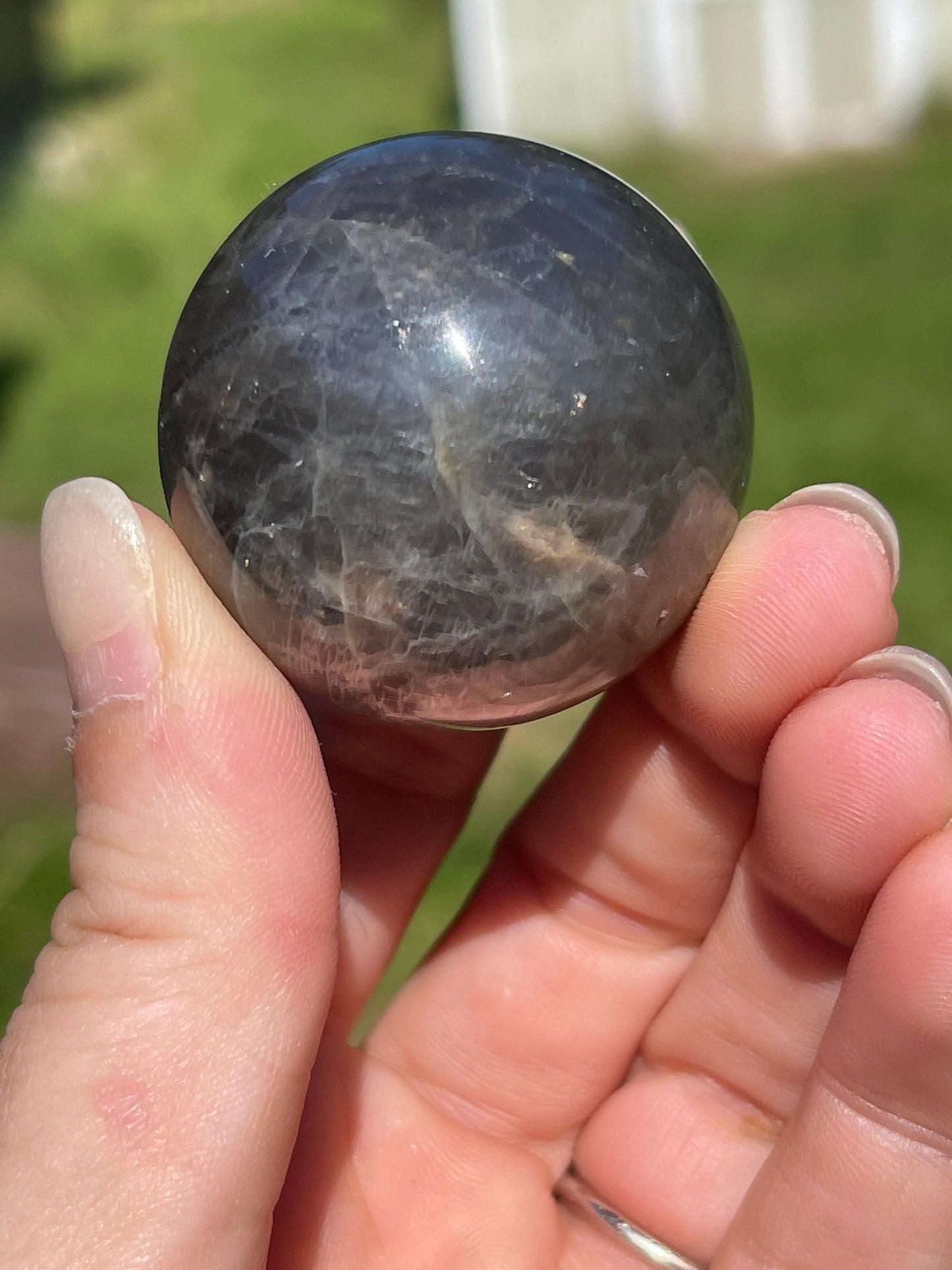 Silver sheen obsidian sphere