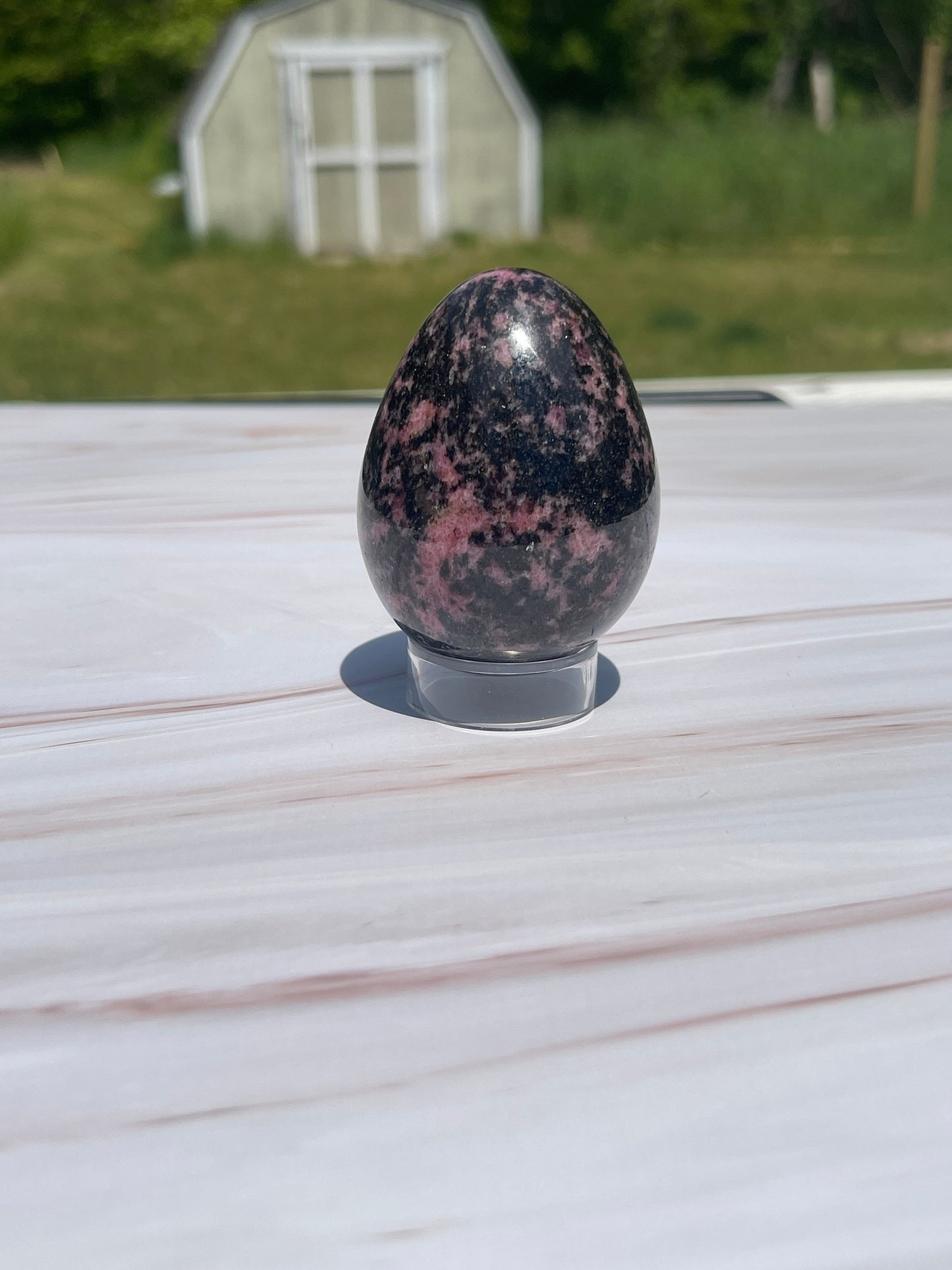 Rhodonite Crystal Egg Carving