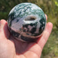 Moss agate sphere with druzy