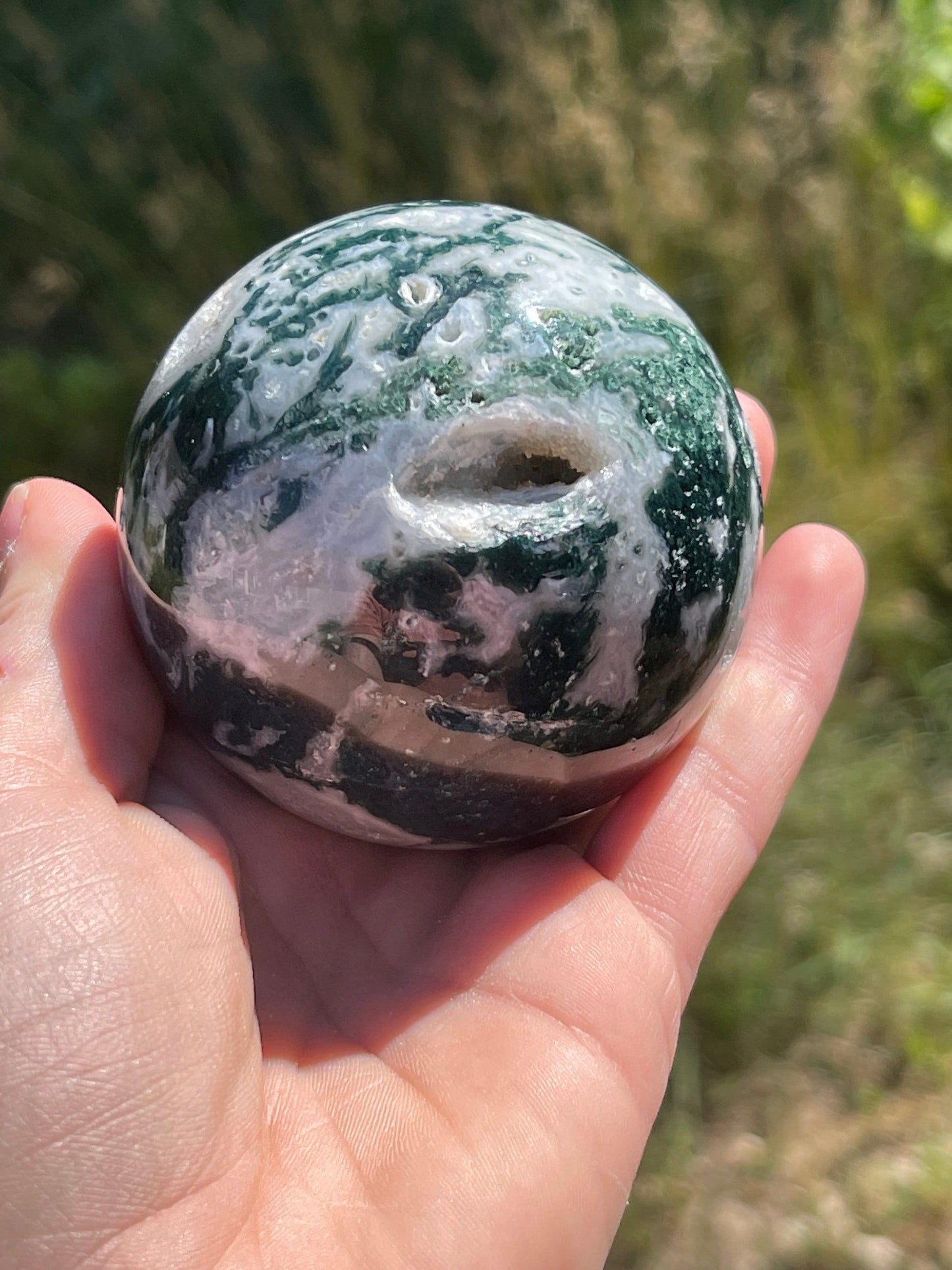Moss agate sphere with druzy