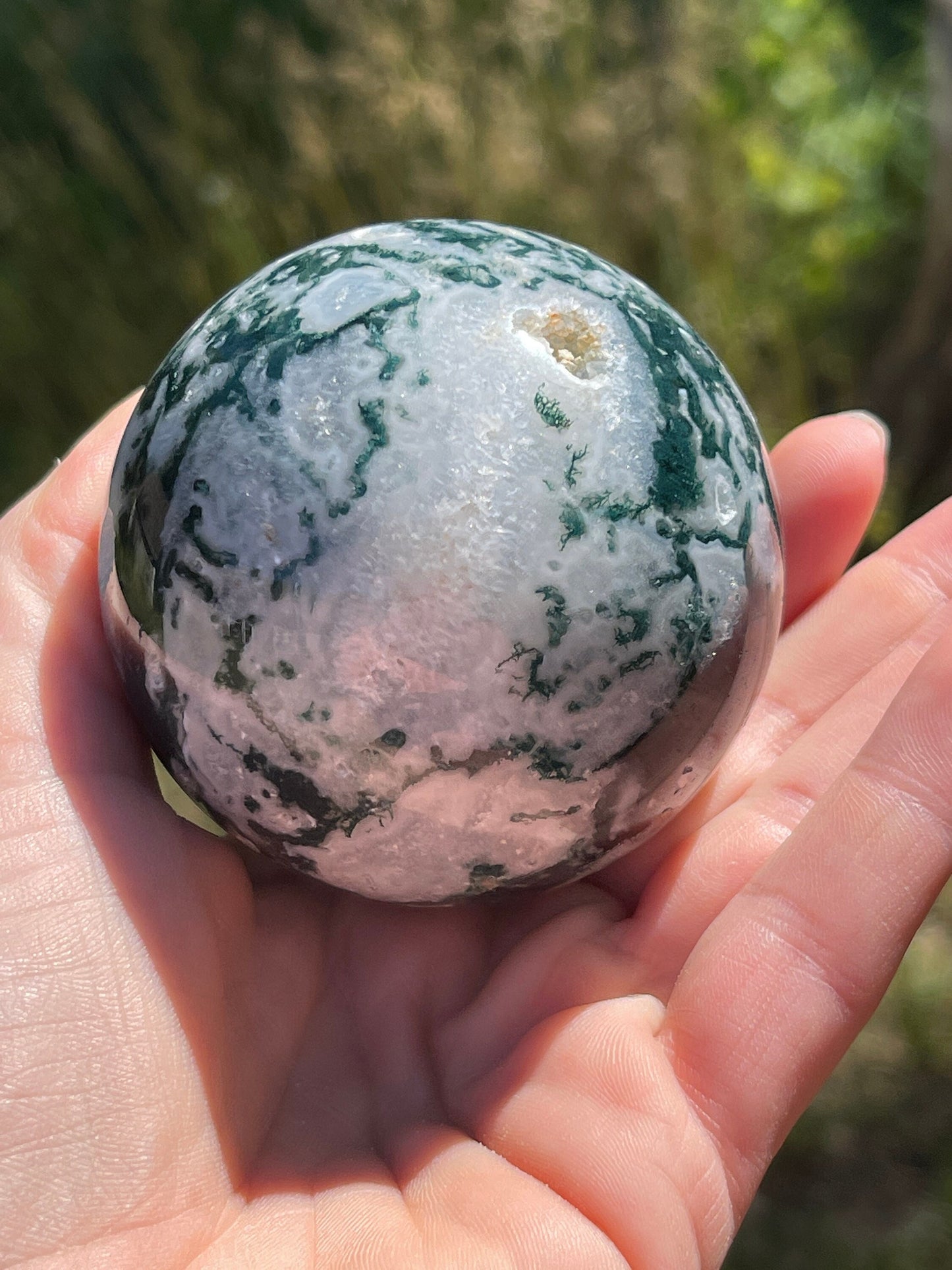 Moss agate sphere with druzy