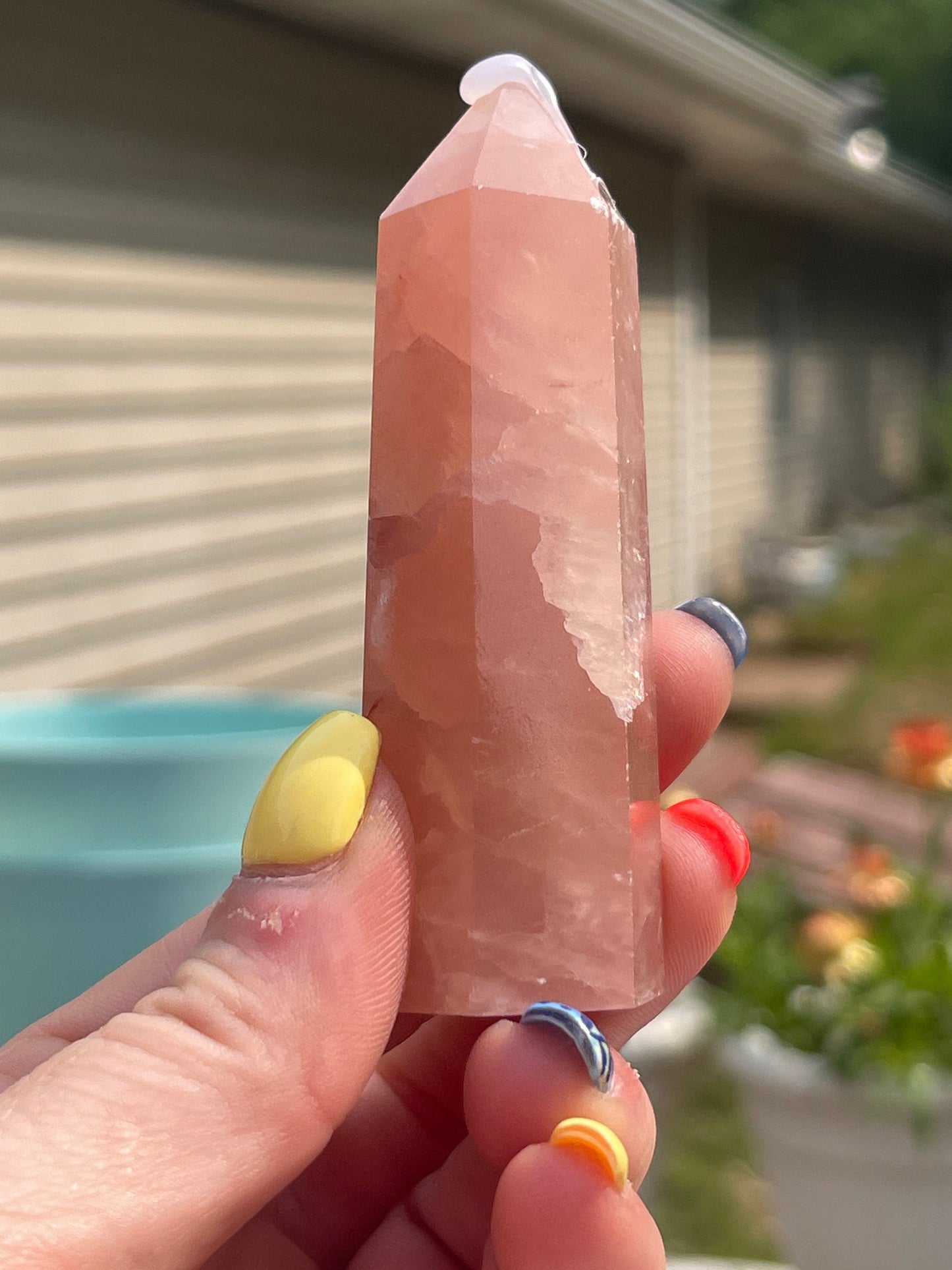 Natural rose calcite tower