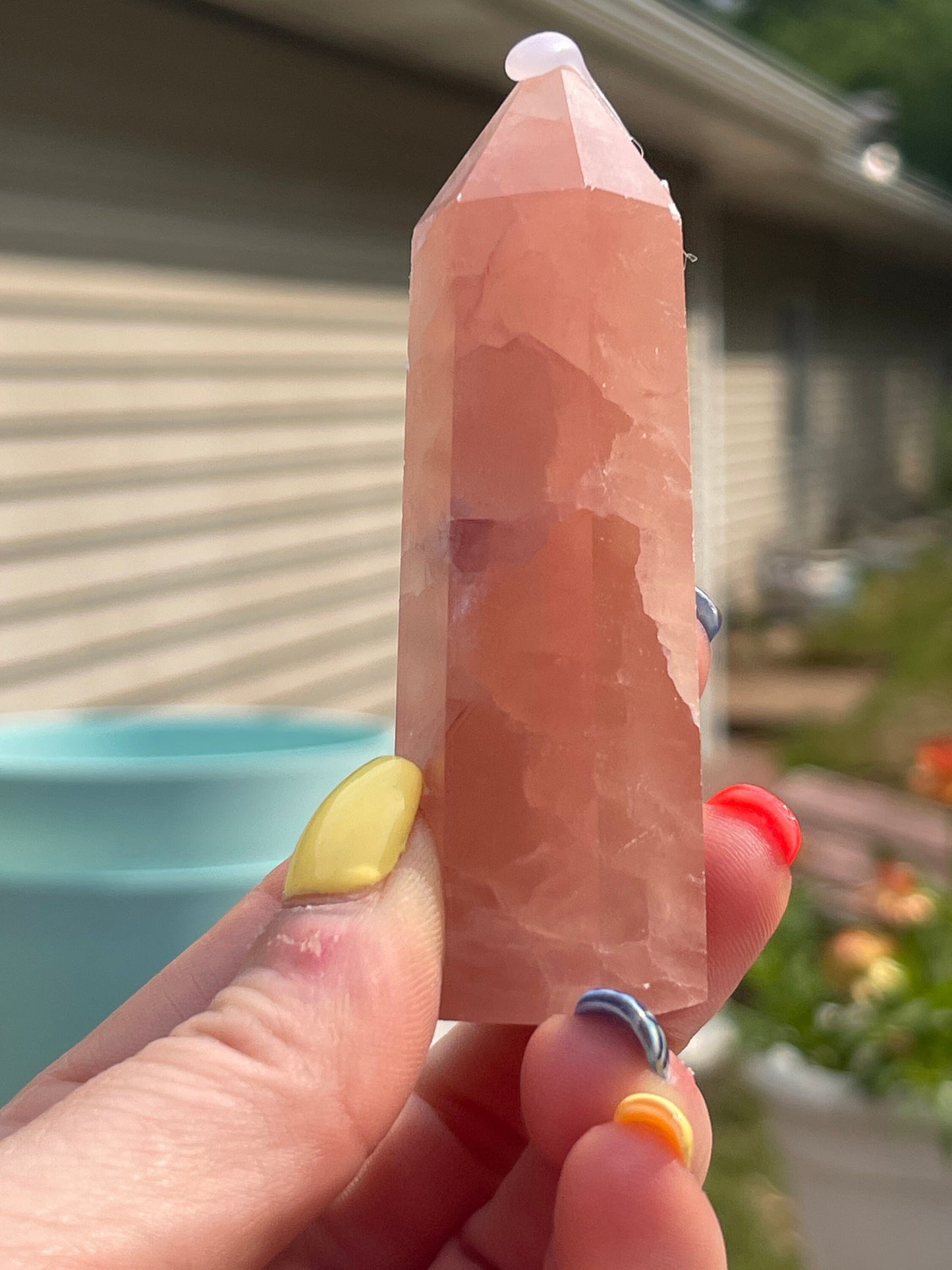 Natural rose calcite tower