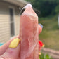 Natural rose calcite tower
