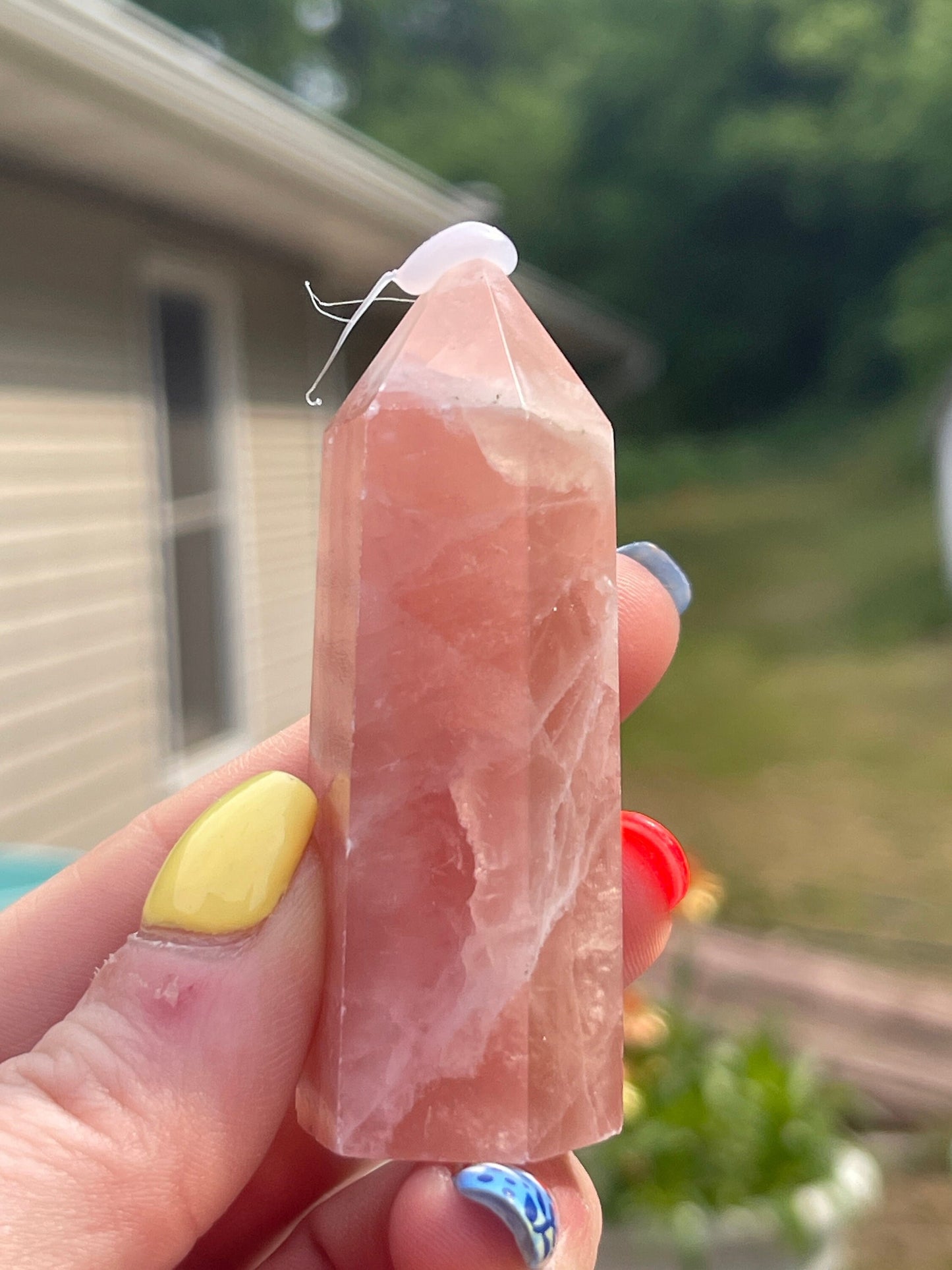 Natural rose calcite tower