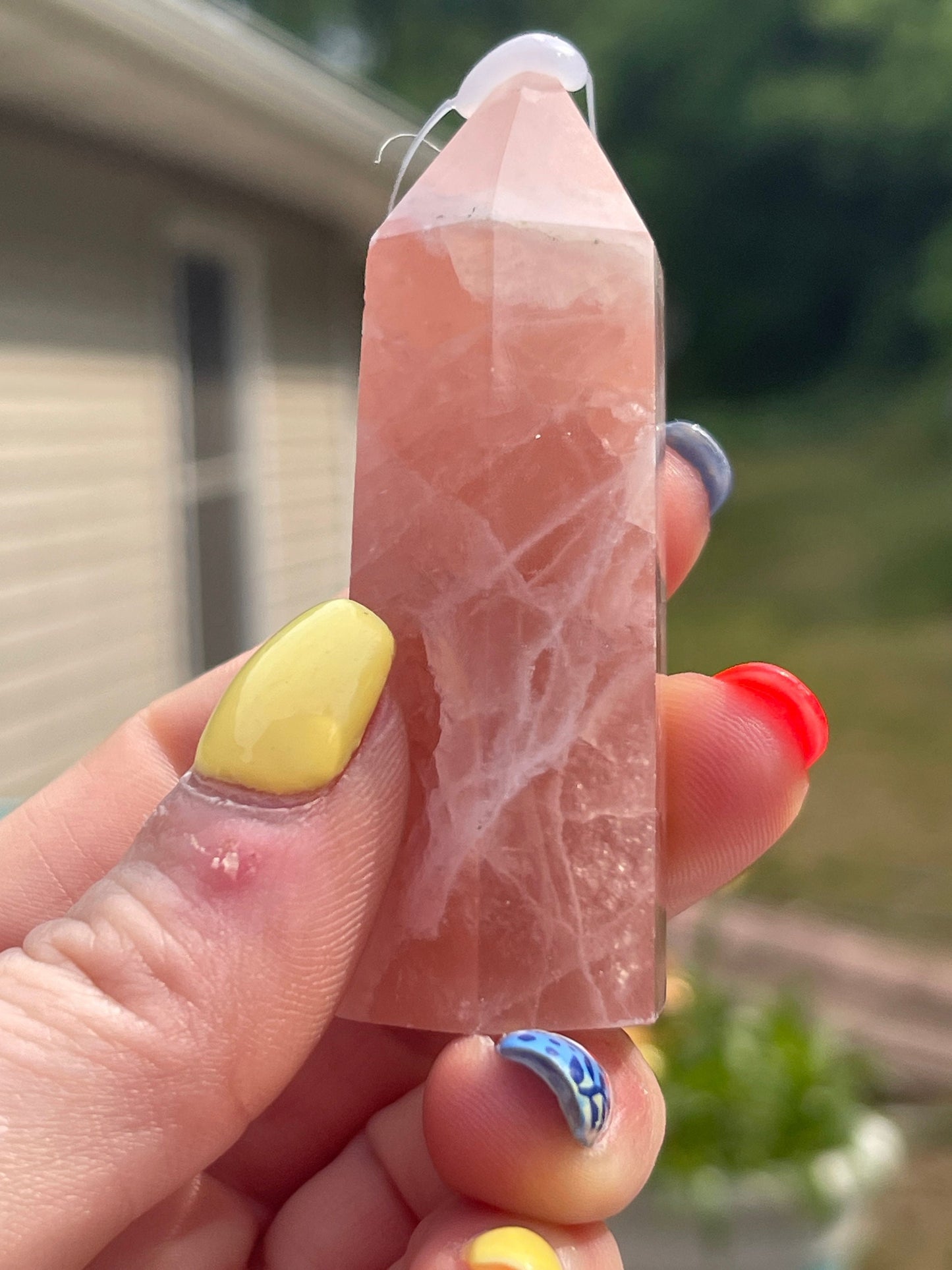 Natural rose calcite tower