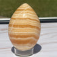 Orange calcite Crystal Egg Carving