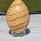 Orange calcite Crystal Egg Carving