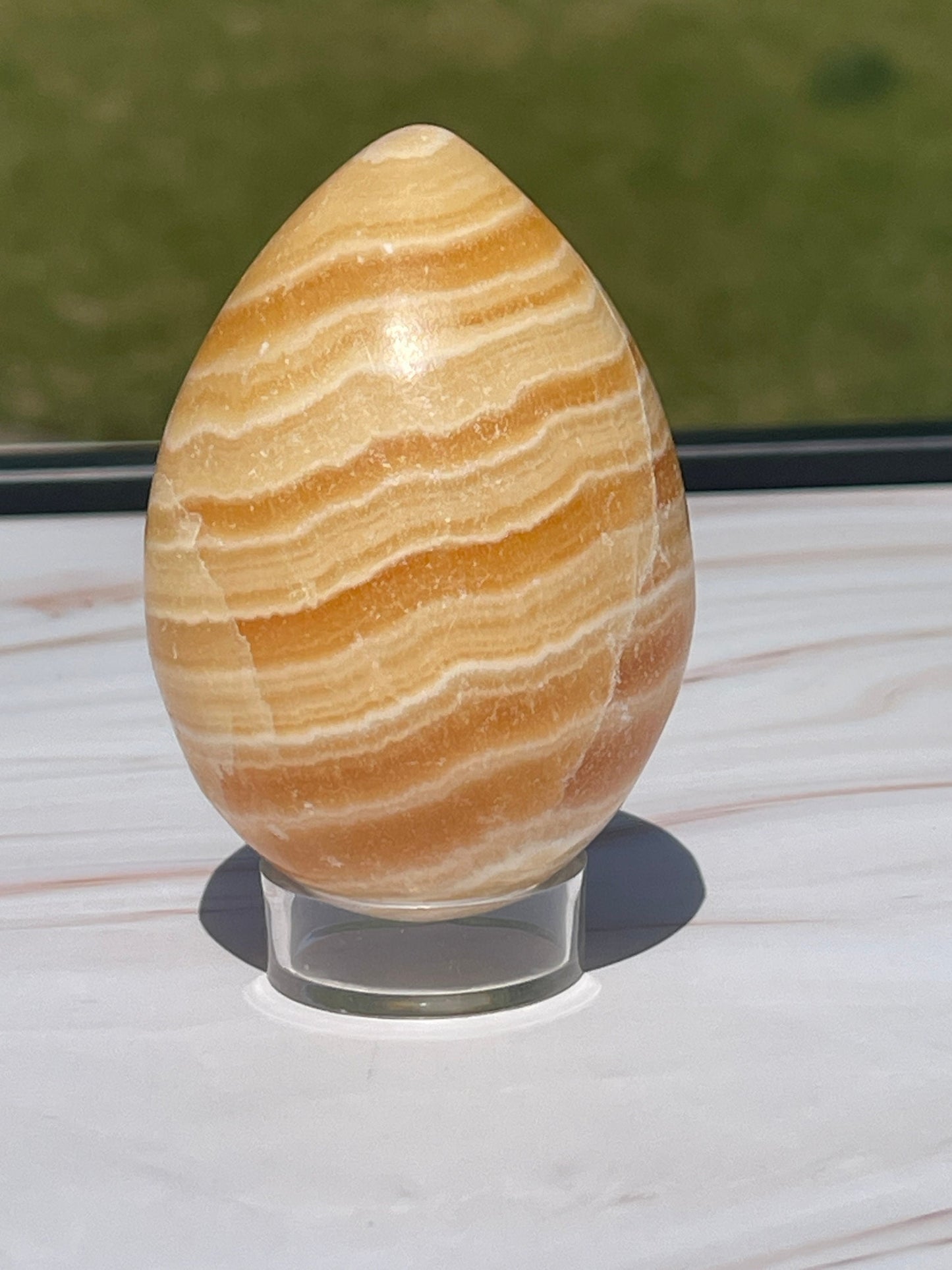 Orange calcite Crystal Egg Carving