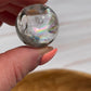 1 Clear quartz mini sphere with rainbows  | crystal carving | meditation crystal | pocket stone