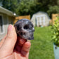 Trolleite min skull carving