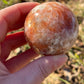Sunstone with moonstone crystal sphere