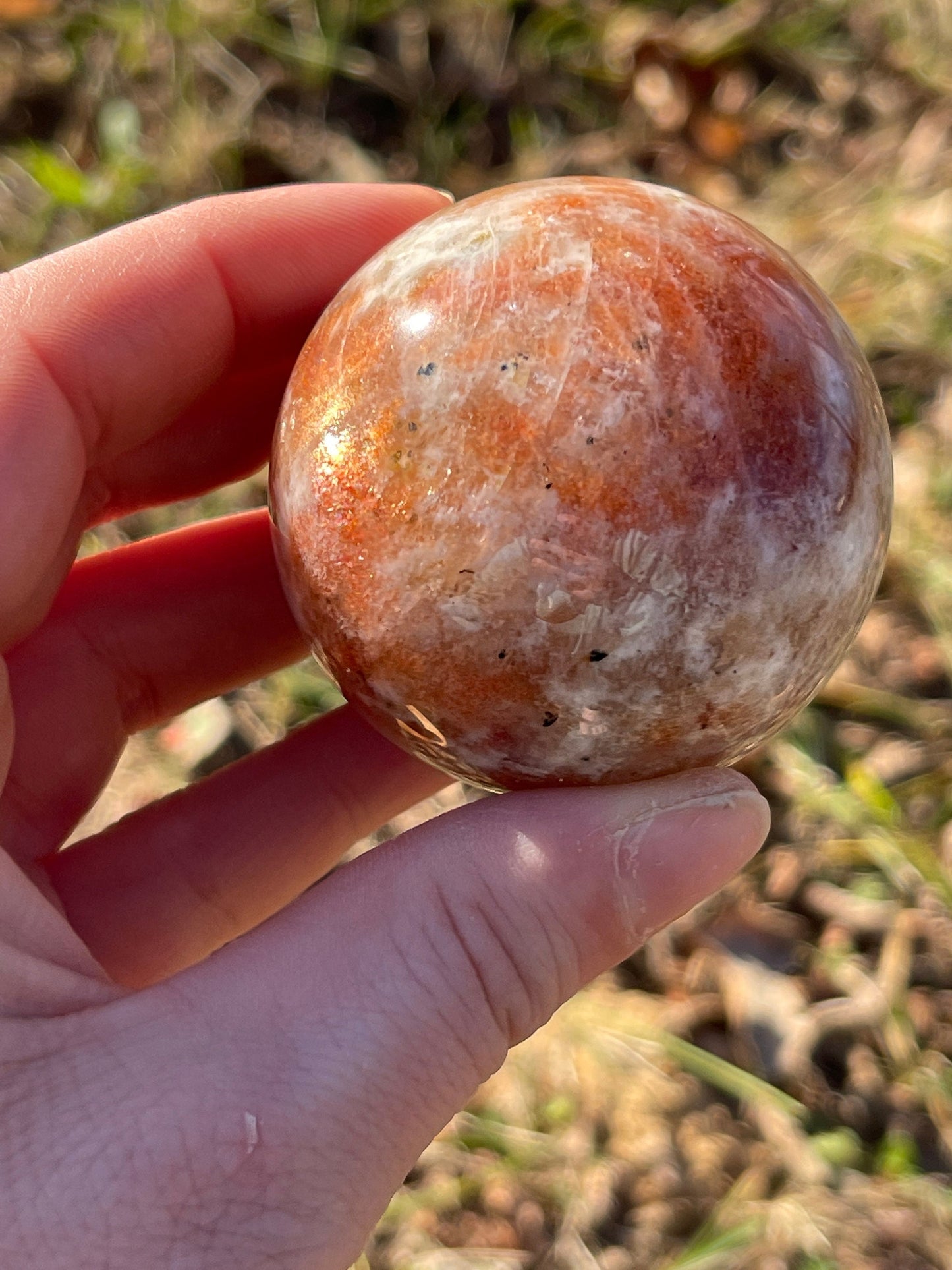 Sunstone with moonstone crystal sphere