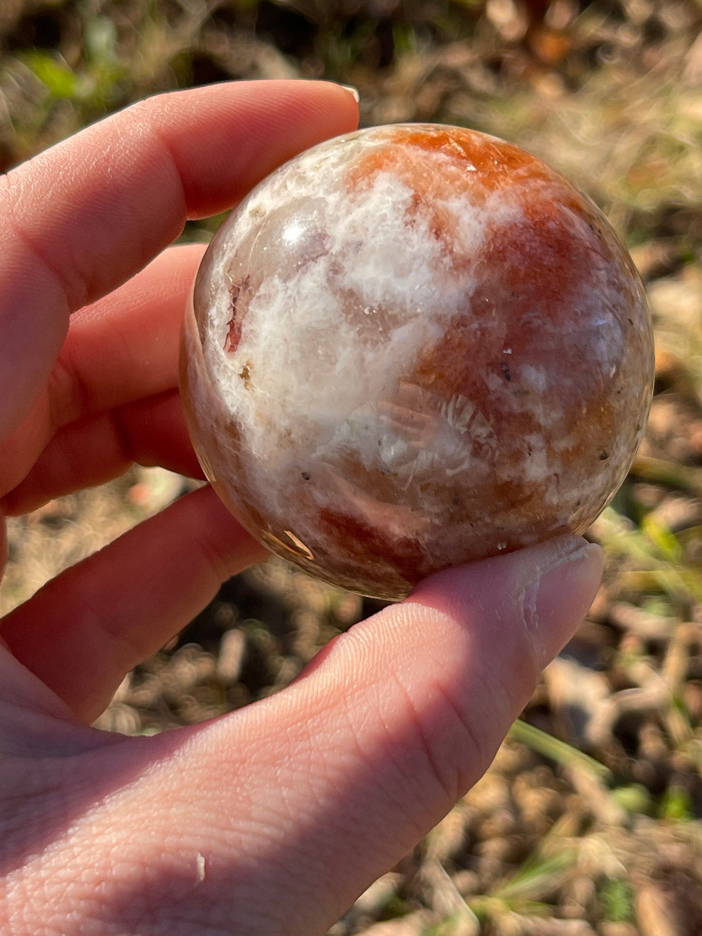 Sunstone with moonstone crystal sphere
