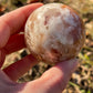 Sunstone with moonstone crystal sphere