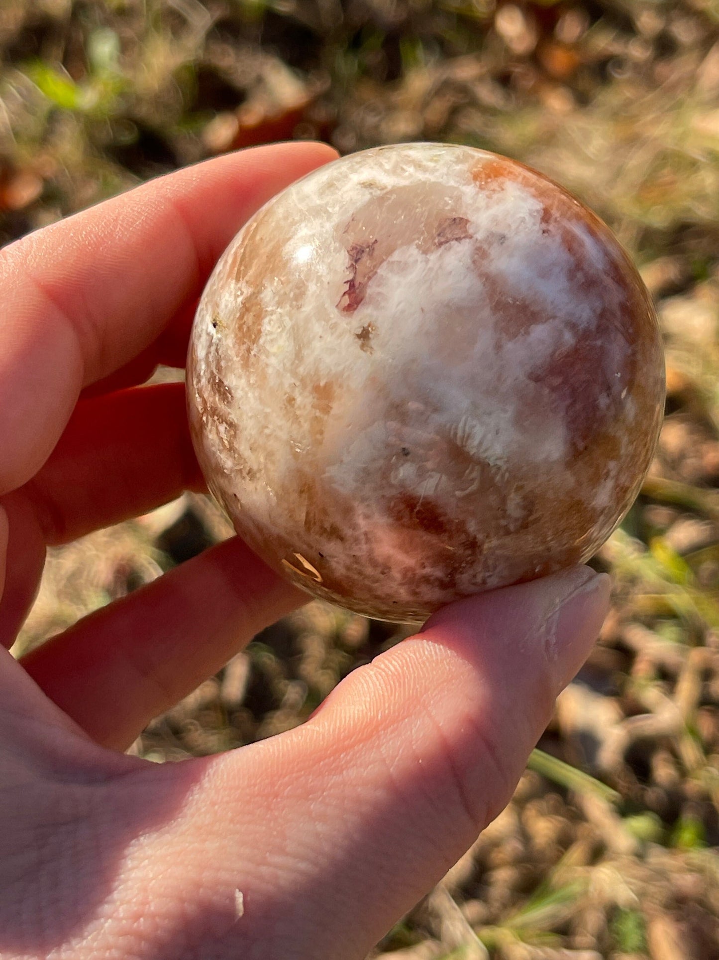 Sunstone with moonstone crystal sphere