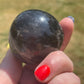 Black Rose Quartz Palm Stone with Flash