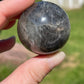 Silver sheen obsidian sphere