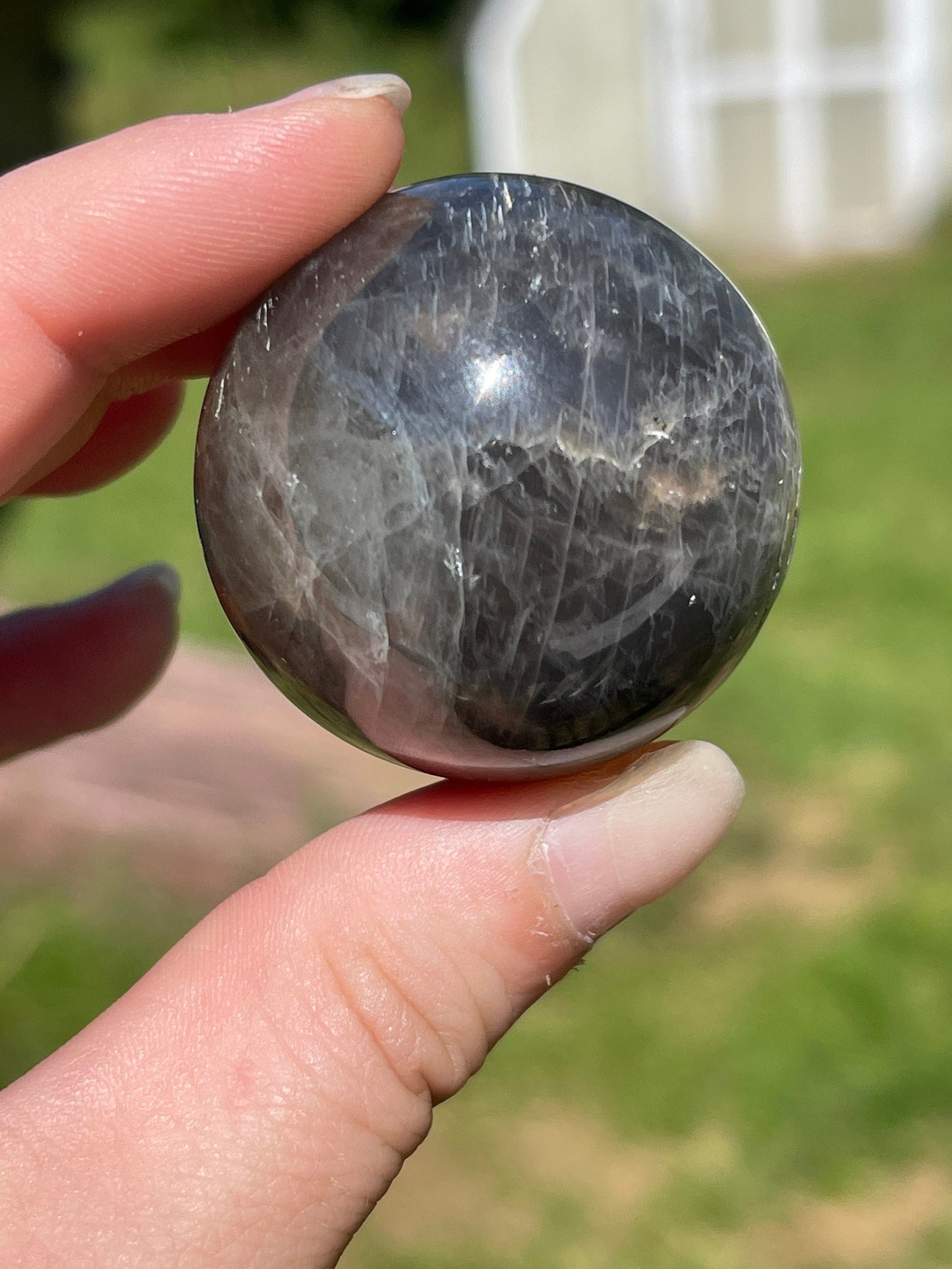 Silver sheen obsidian sphere