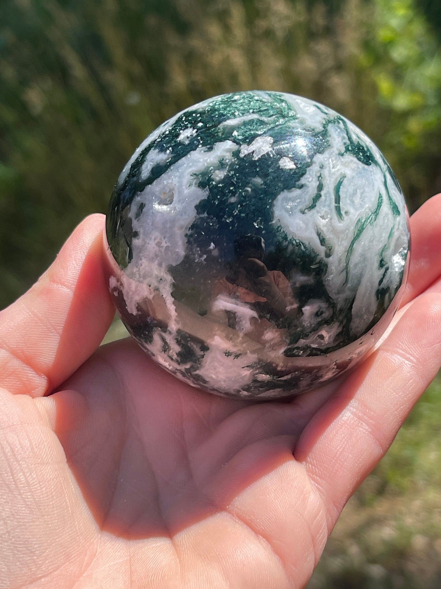 Moss agate sphere with druzy