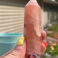 Natural rose calcite tower