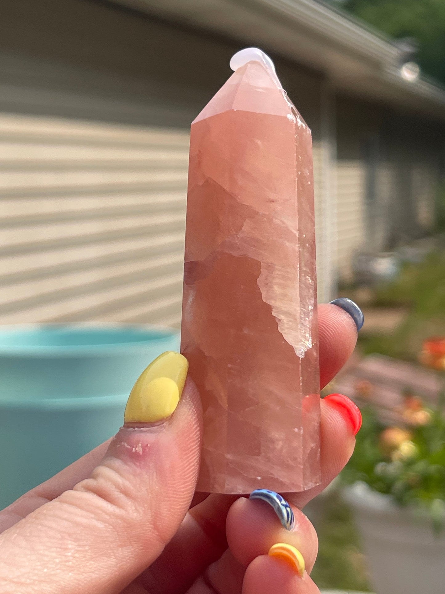 Natural rose calcite tower