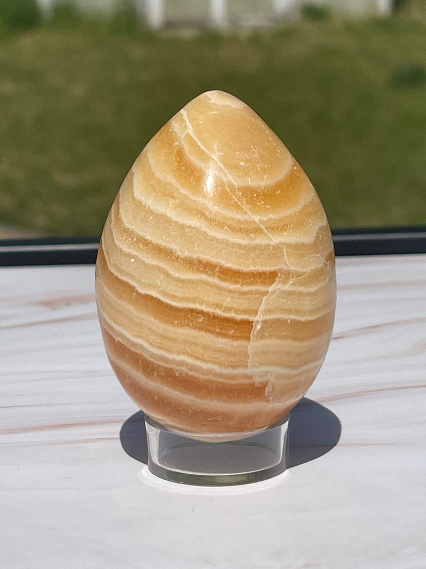 Orange calcite Crystal Egg Carving