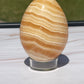 Orange calcite Crystal Egg Carving