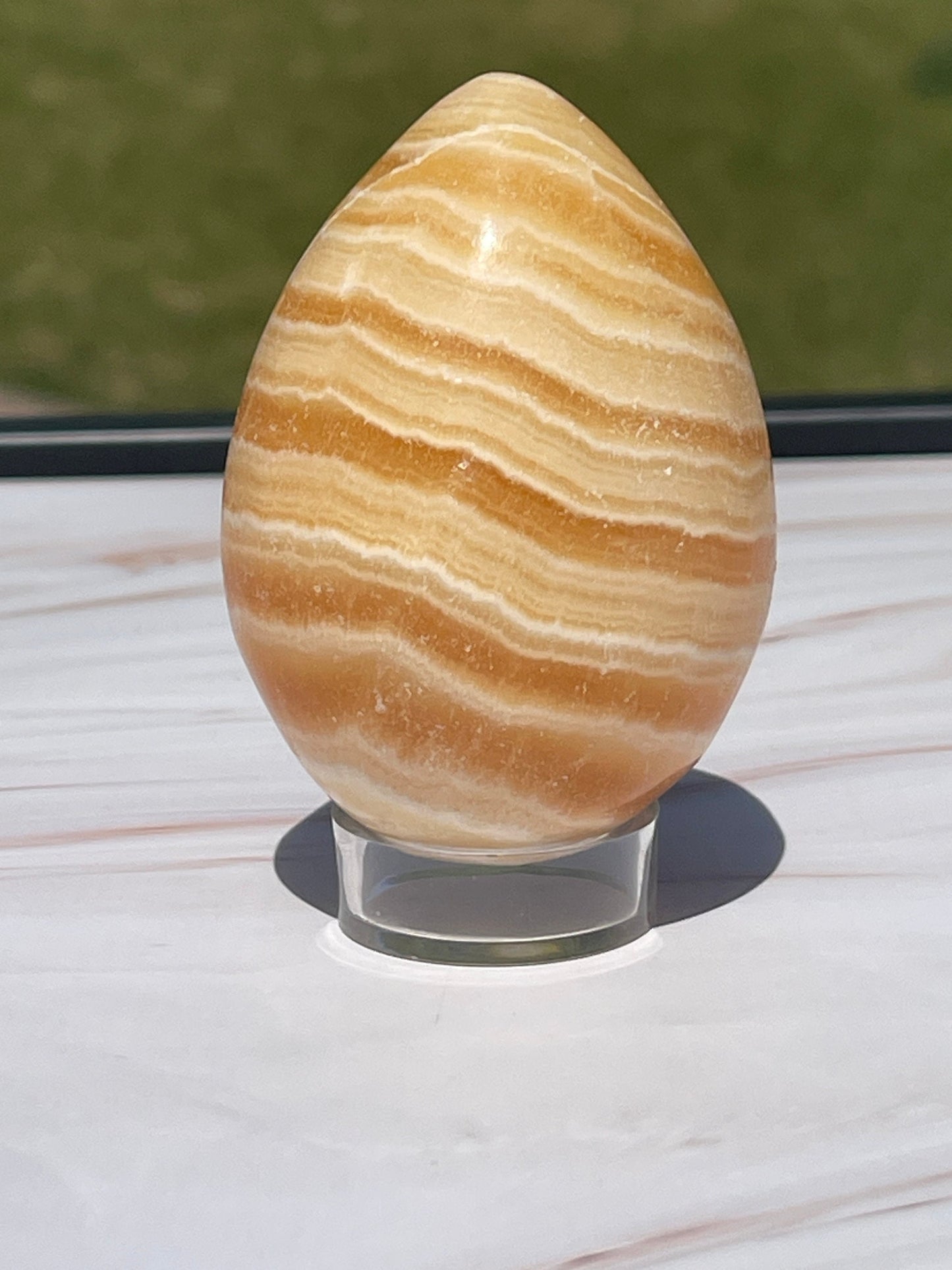 Orange calcite Crystal Egg Carving