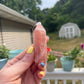 Natural rose calcite tower