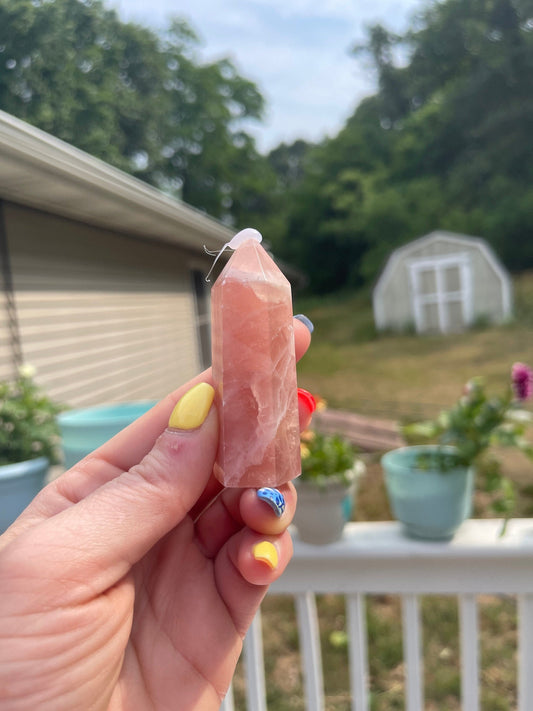 Natural rose calcite tower