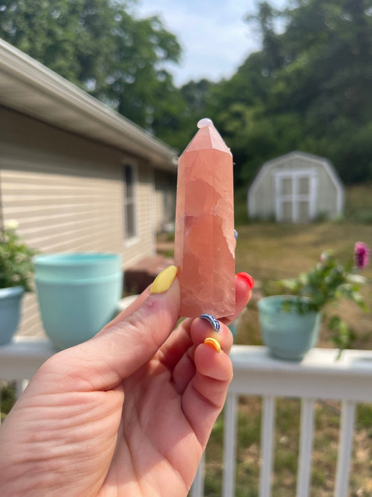 Natural rose calcite tower