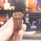 Mixed material mini coffin carving