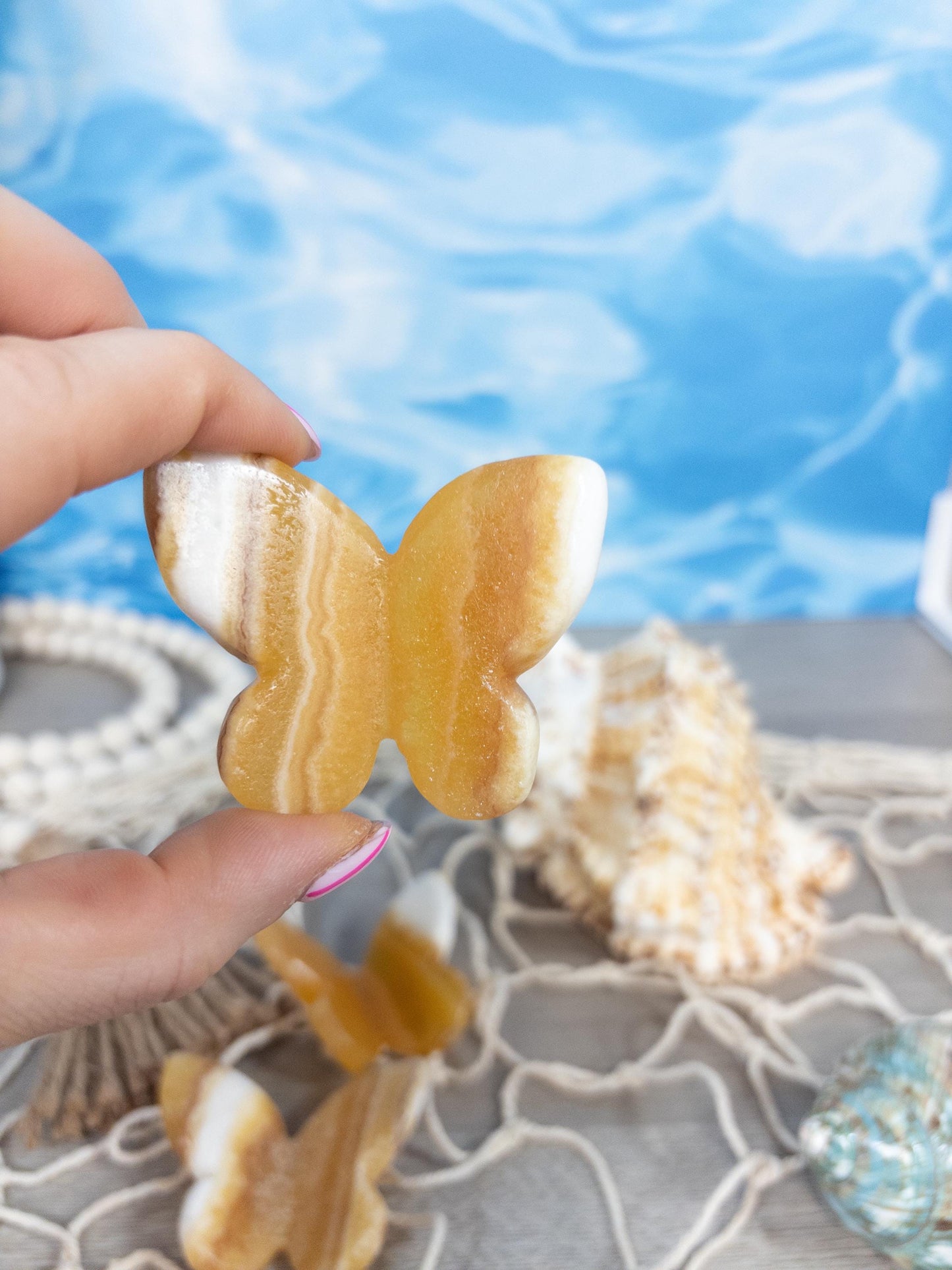 1 Orange calcite 3D butterfly carving