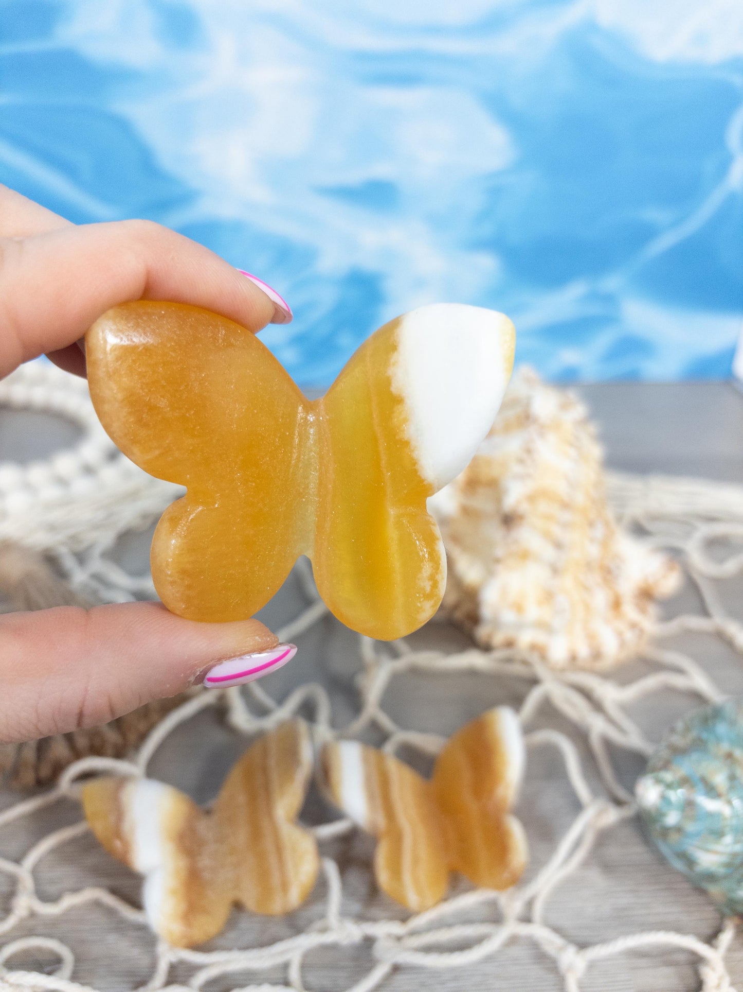 1 Orange calcite 3D butterfly carving
