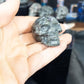 1 Small Yooperlite UV reactive Skull Carving