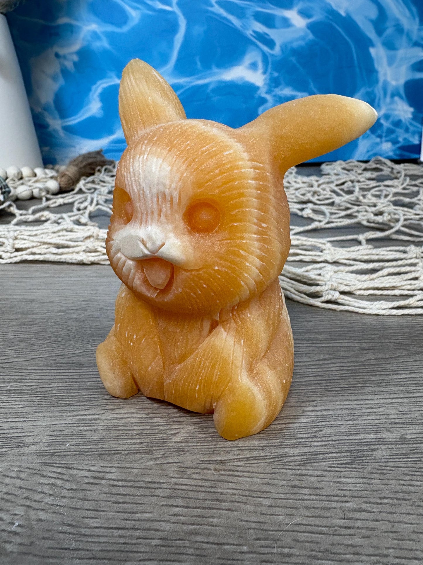 Orange calcite pikachu carving